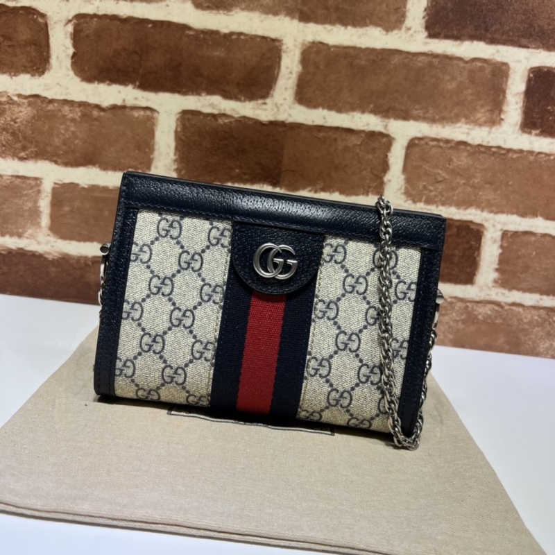 G*u*i clutch bags